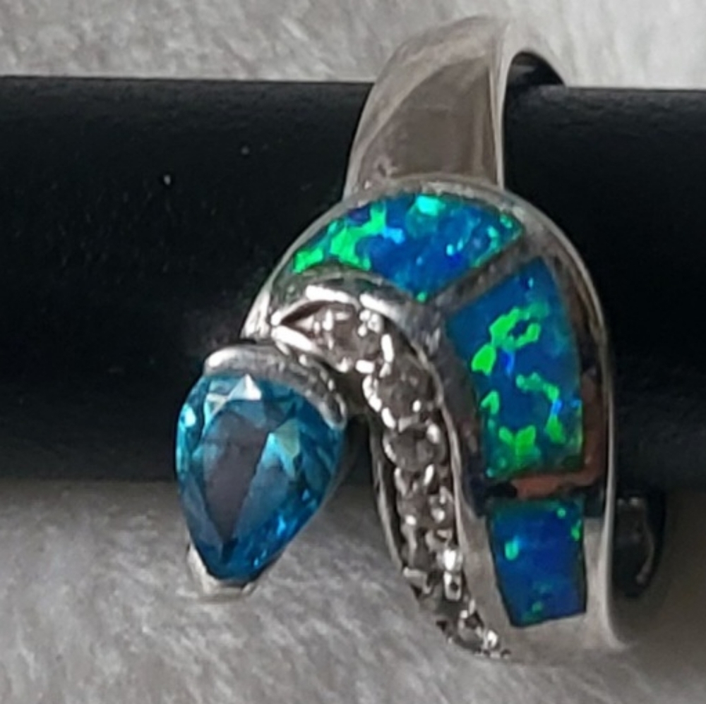 Sterling silver blue topaz opal ring.